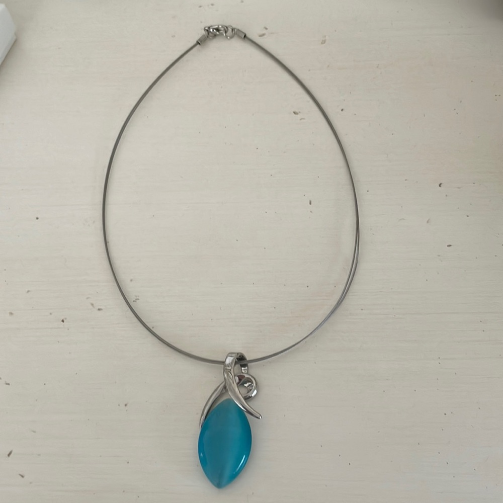 Silver necklace with blue pendant